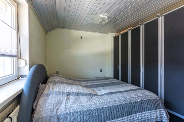 Foto - Te koop: Leuke, uitgebouwde tussenwoning uit 1927 met 3 slaapkamers en garage in de wijk Heksenberg